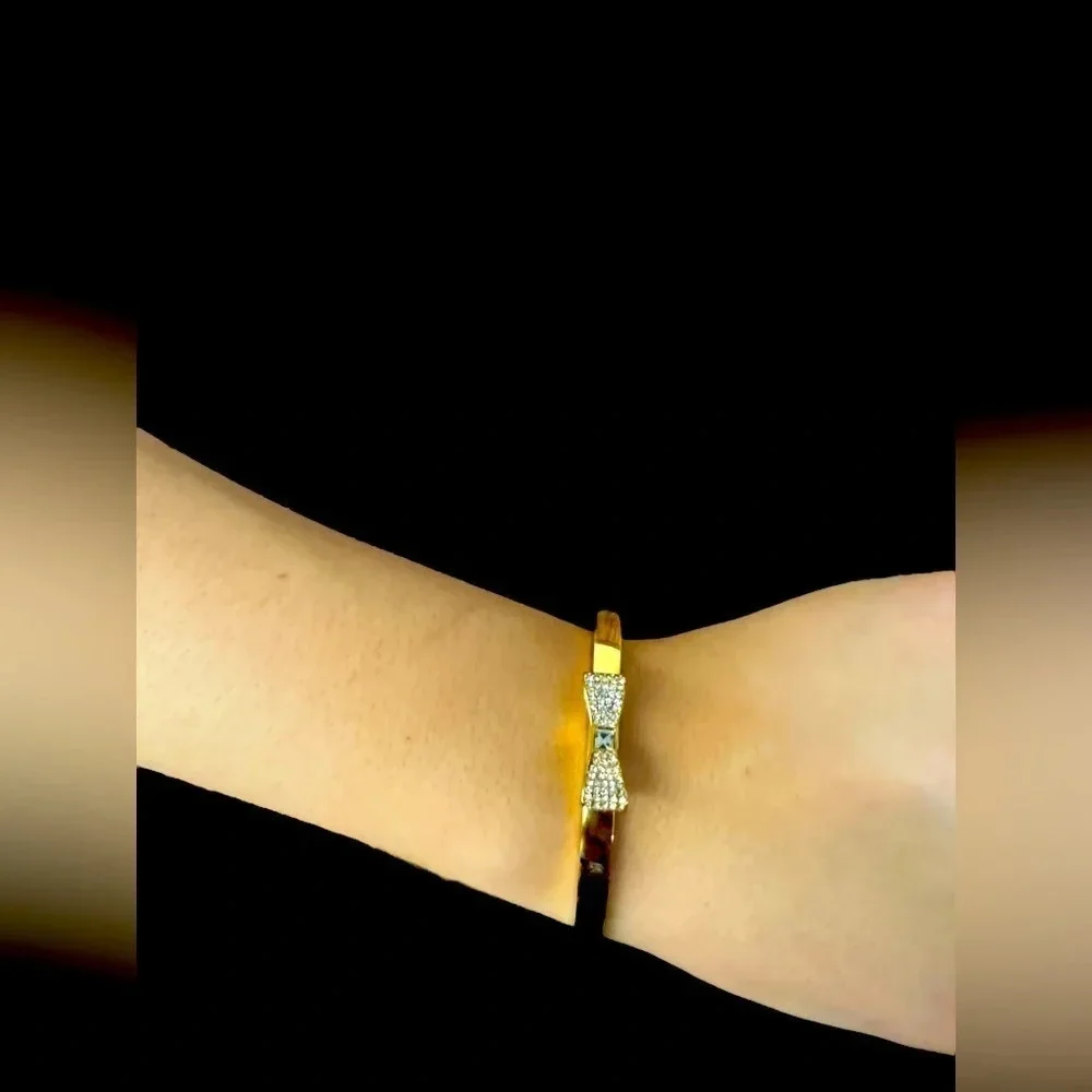 Kate Spade gold bangle bracelet with rhinestone bow - Picture 2 of 8